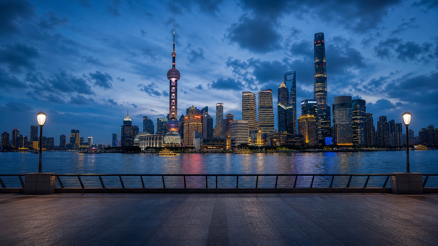 An uninterrupted cinematic view from Shanghai's Bund across the Huangpu River at blue hour, with no tourists